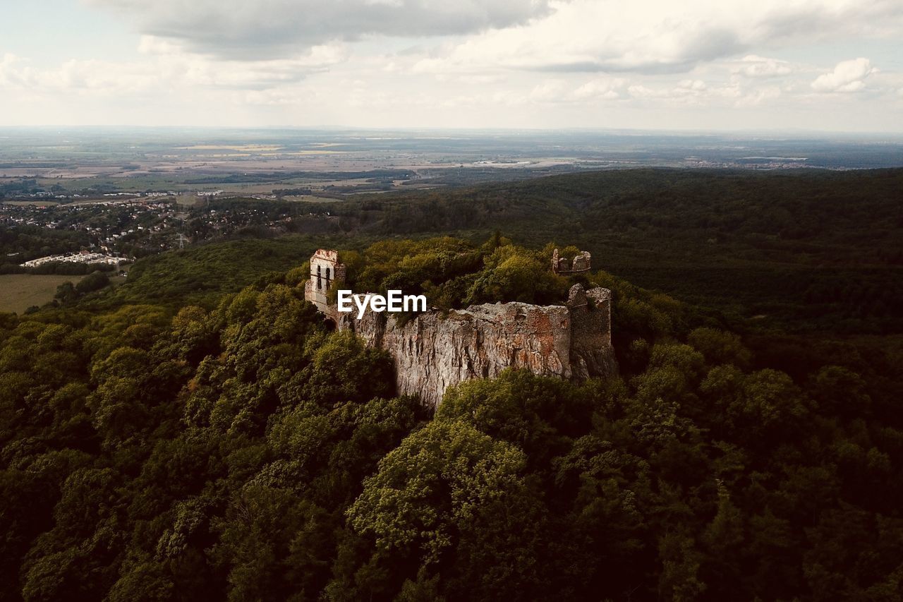 Drone  view of trees and old castle ruins against sky