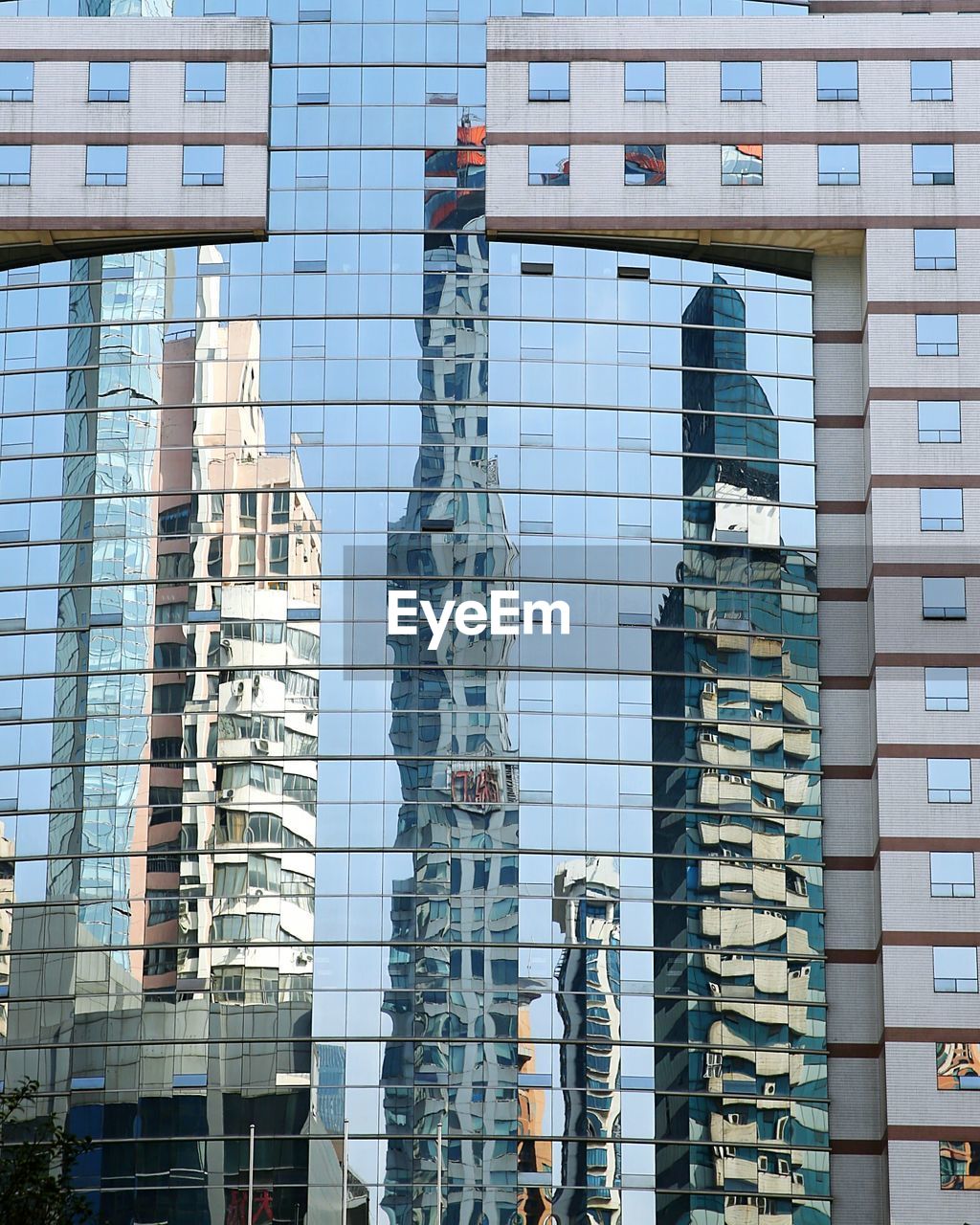 Full frame shot of modern building with reflection