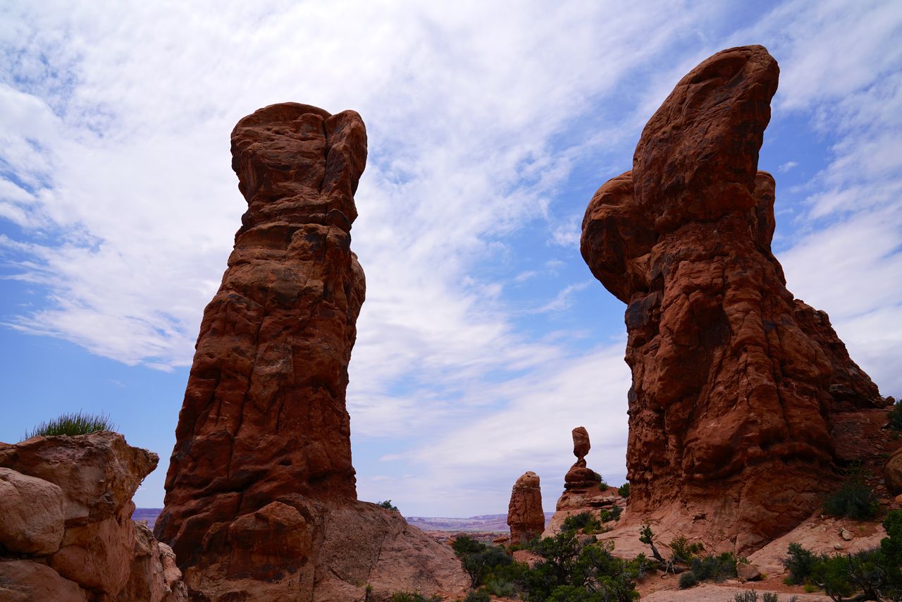 Low angle view of rock formation against sky