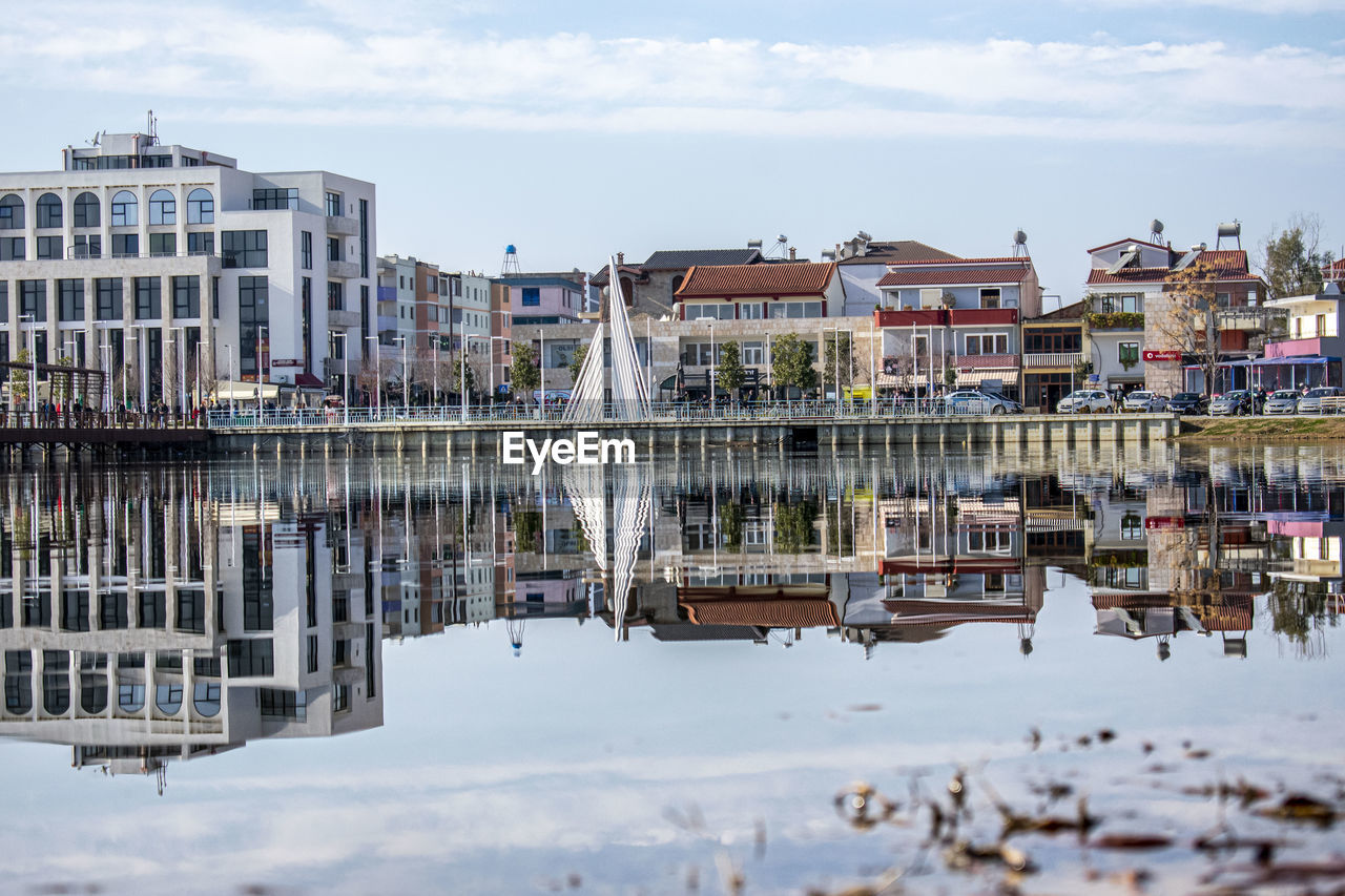 Reflection of buildings in lake