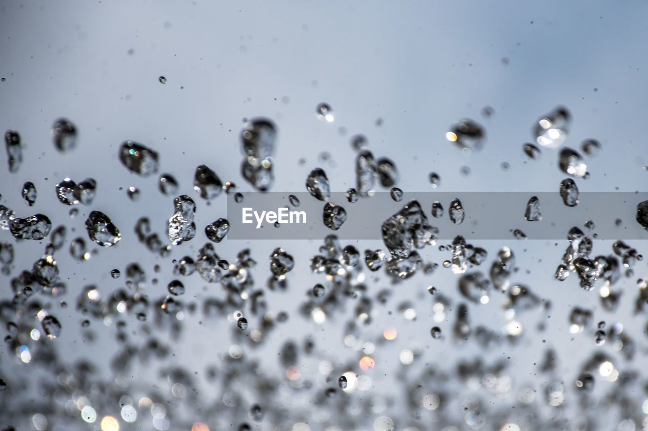 WATER DROPS ON GLASS WINDOW