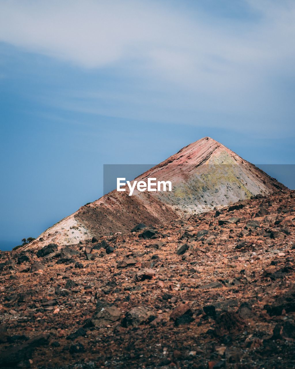 Low angle view of rock formation against sky