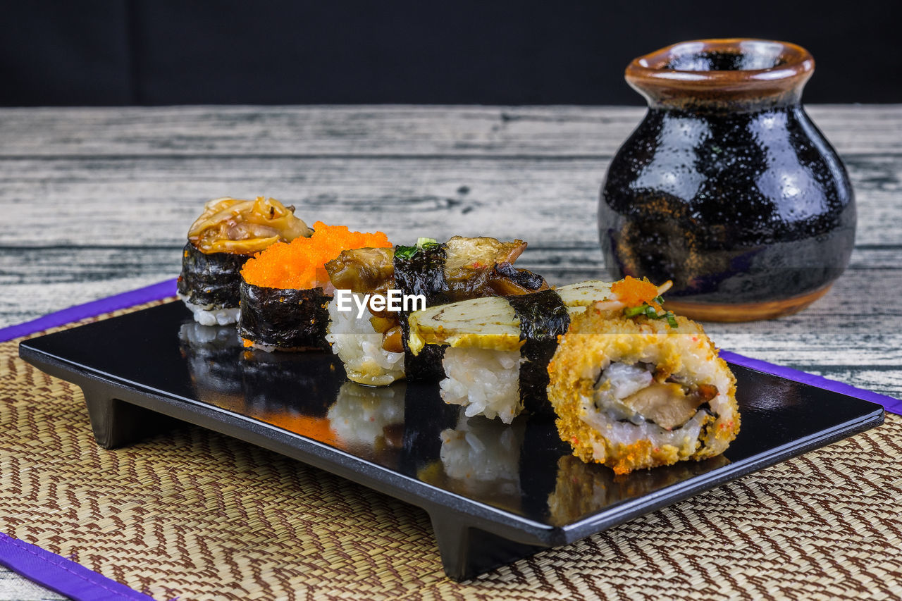 Close-up of sushi served on table