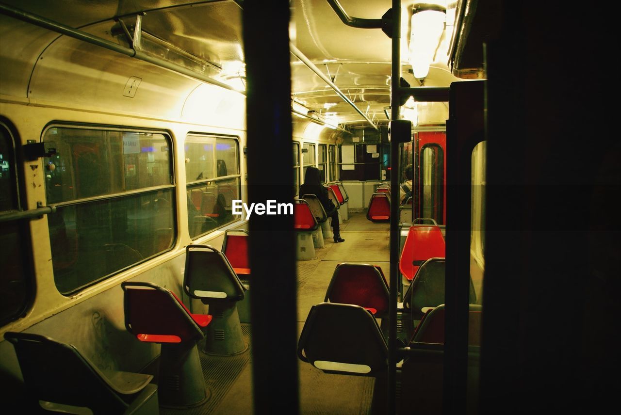 Empty seats and aisle in train