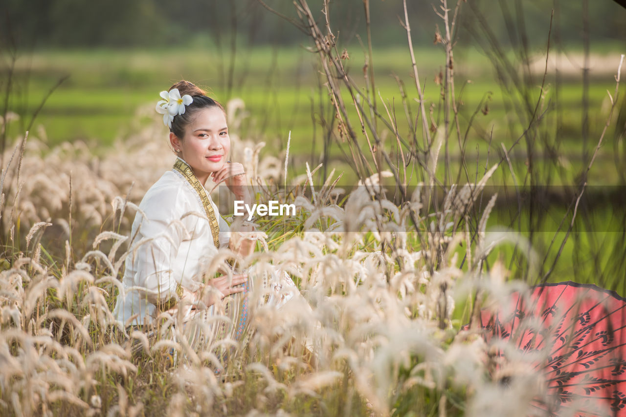 Young woman on field