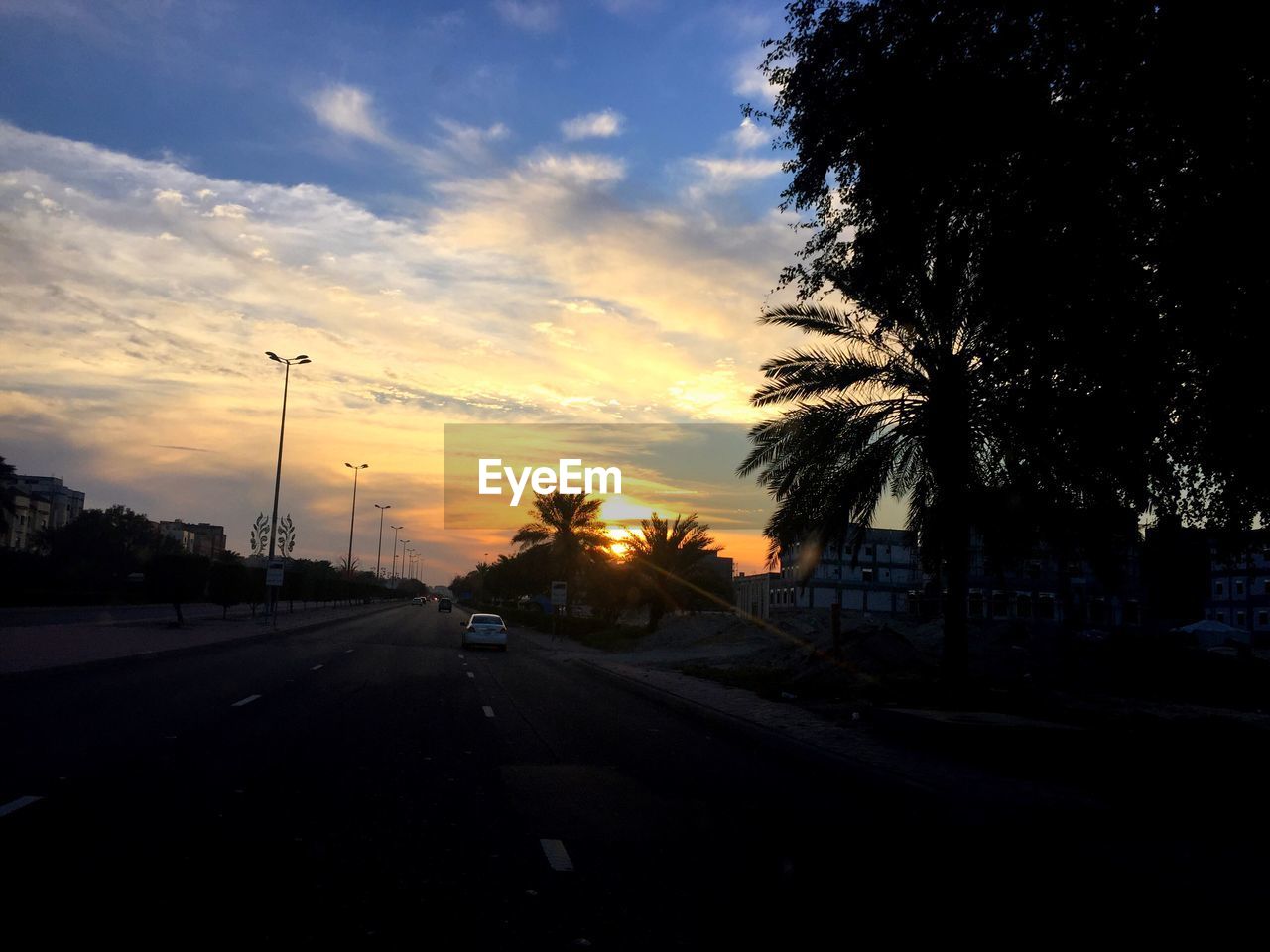 VIEW OF ROAD AT SUNSET