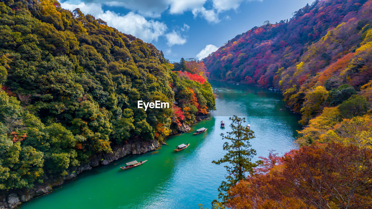 Arashiyama in autumn season along the river in kyoto, japan,  arashiyama, kyoto, japan, asia.