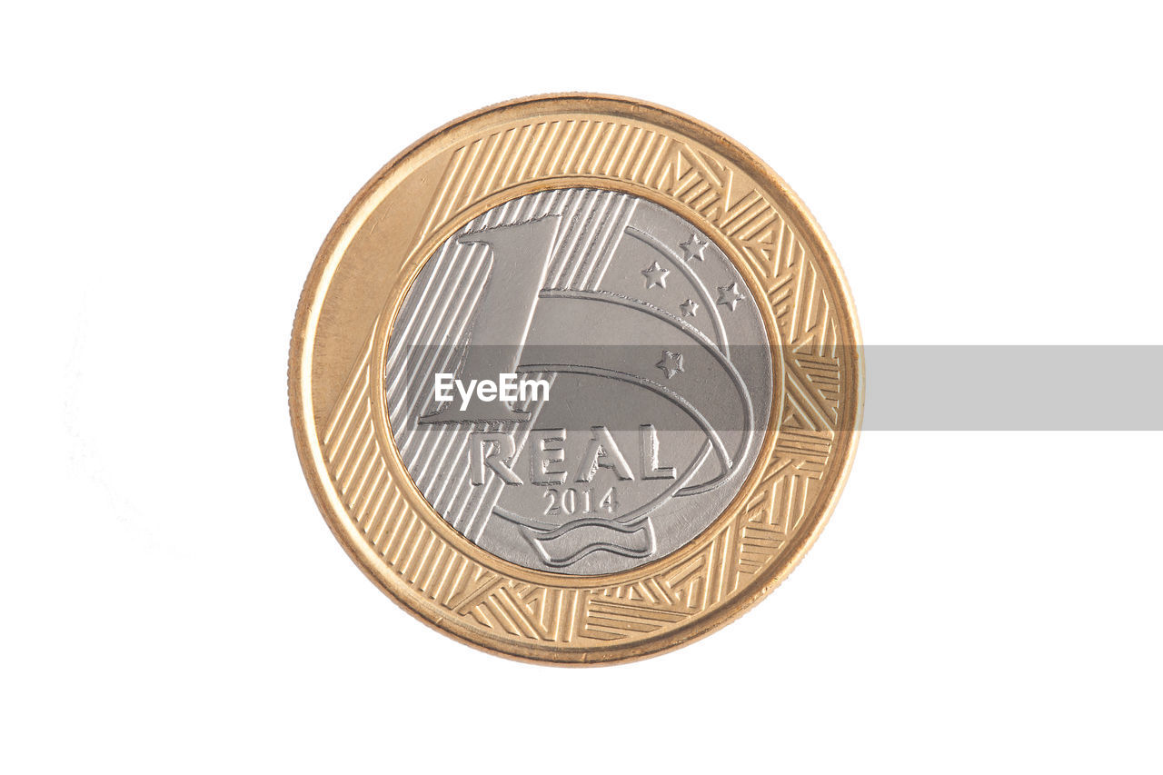 Close-up of coin against white background