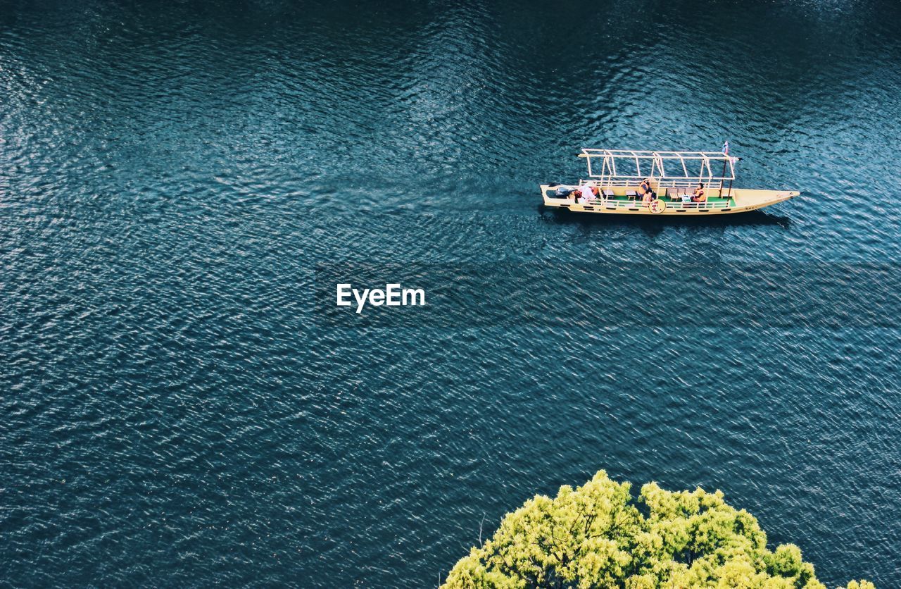 High angle view of ship sailing in sea