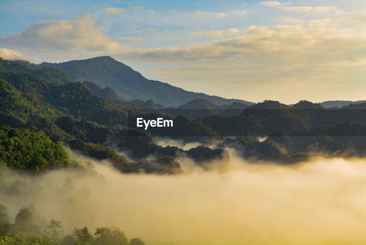 Scenic view of mountains against sky during sunset