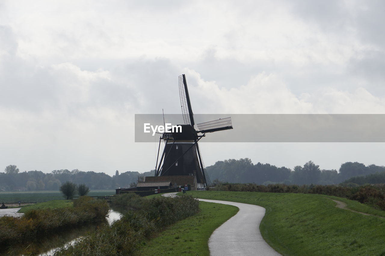 TRADITIONAL WINDMILL ON FIELD