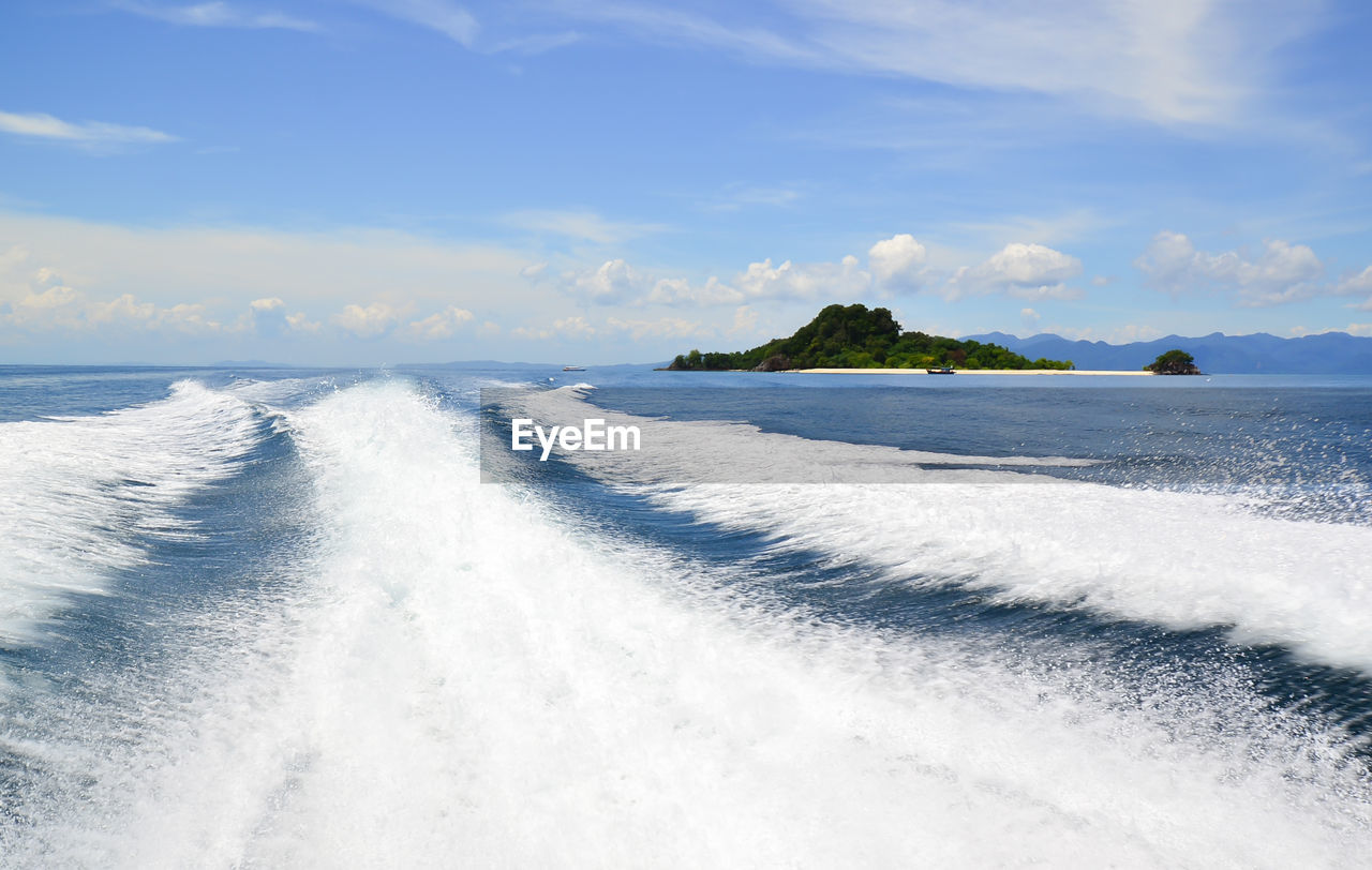 SCENIC VIEW OF SEA WAVES AGAINST SKY