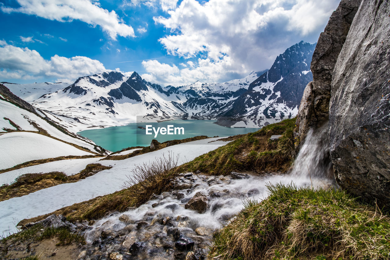 Scenic view of mountains against sky during winter