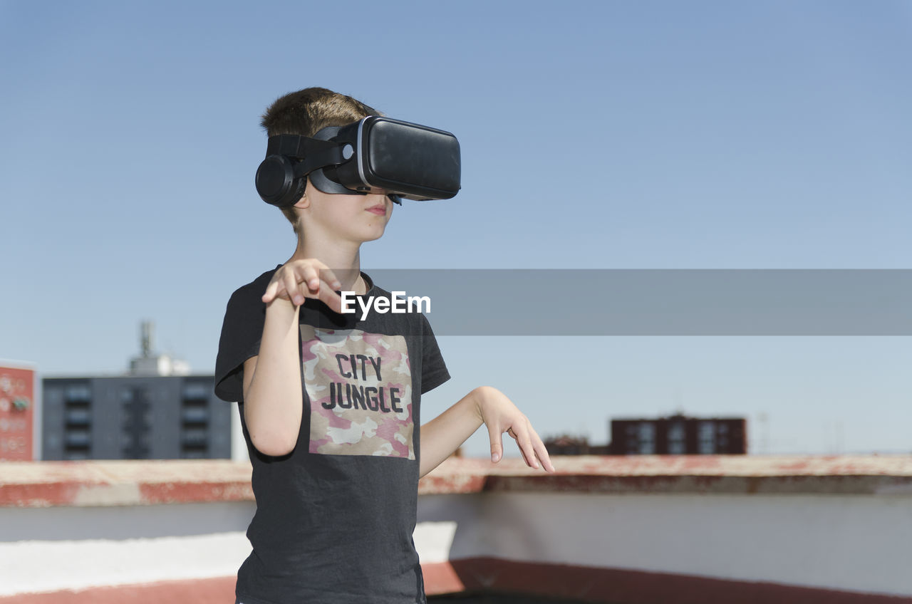 Virtual reality experience young man having a funny moment