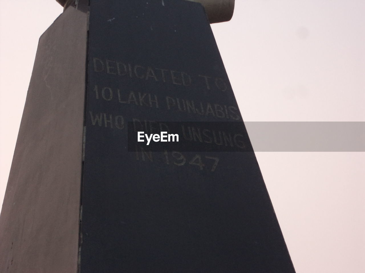 LOW ANGLE VIEW OF INFORMATION SIGN AGAINST SKY