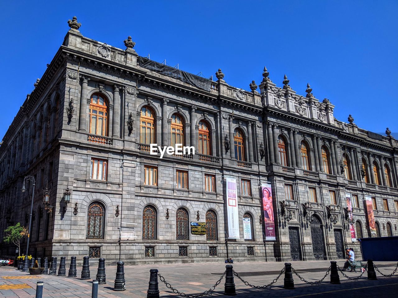 EXTERIOR OF HISTORIC BUILDING AGAINST BLUE SKY