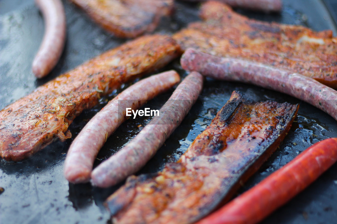 Close-up of meat on barbecue grill