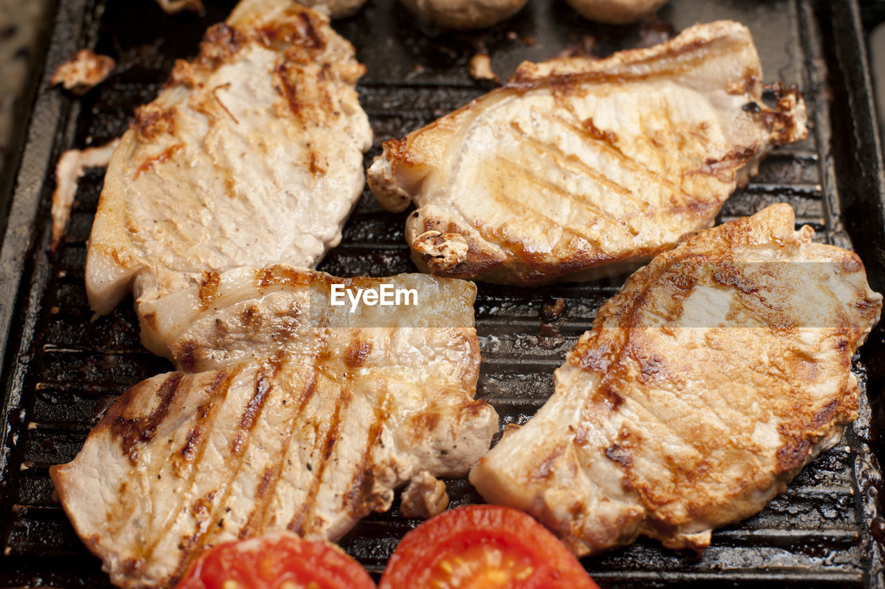 Close-up of meat on barbecue grill