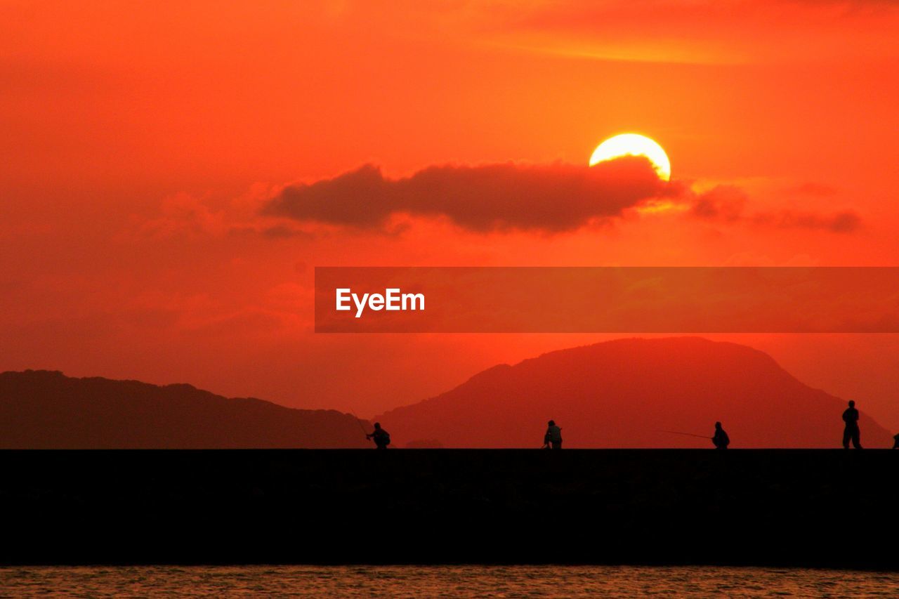 Scenic view of sea at sunset