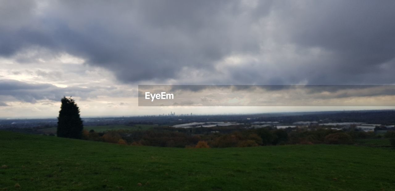 SCENIC VIEW OF LANDSCAPE AGAINST SKY DURING SUNRISE