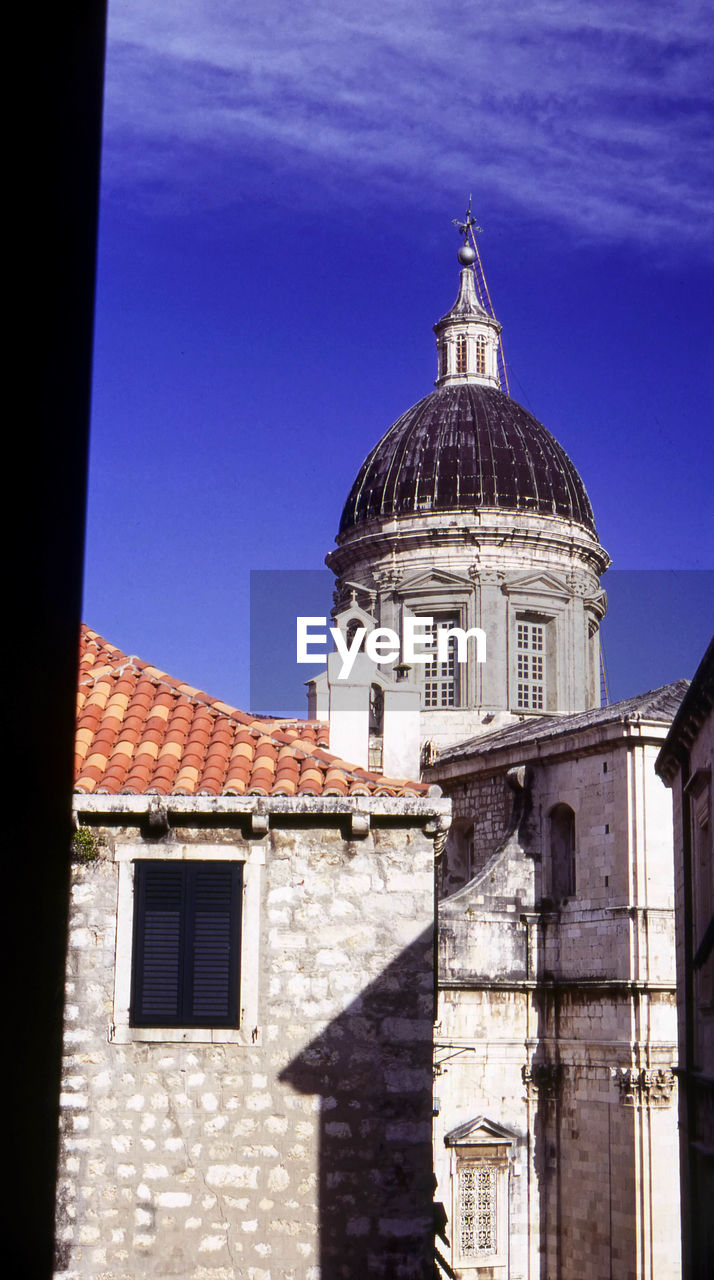 MOSQUE AGAINST SKY