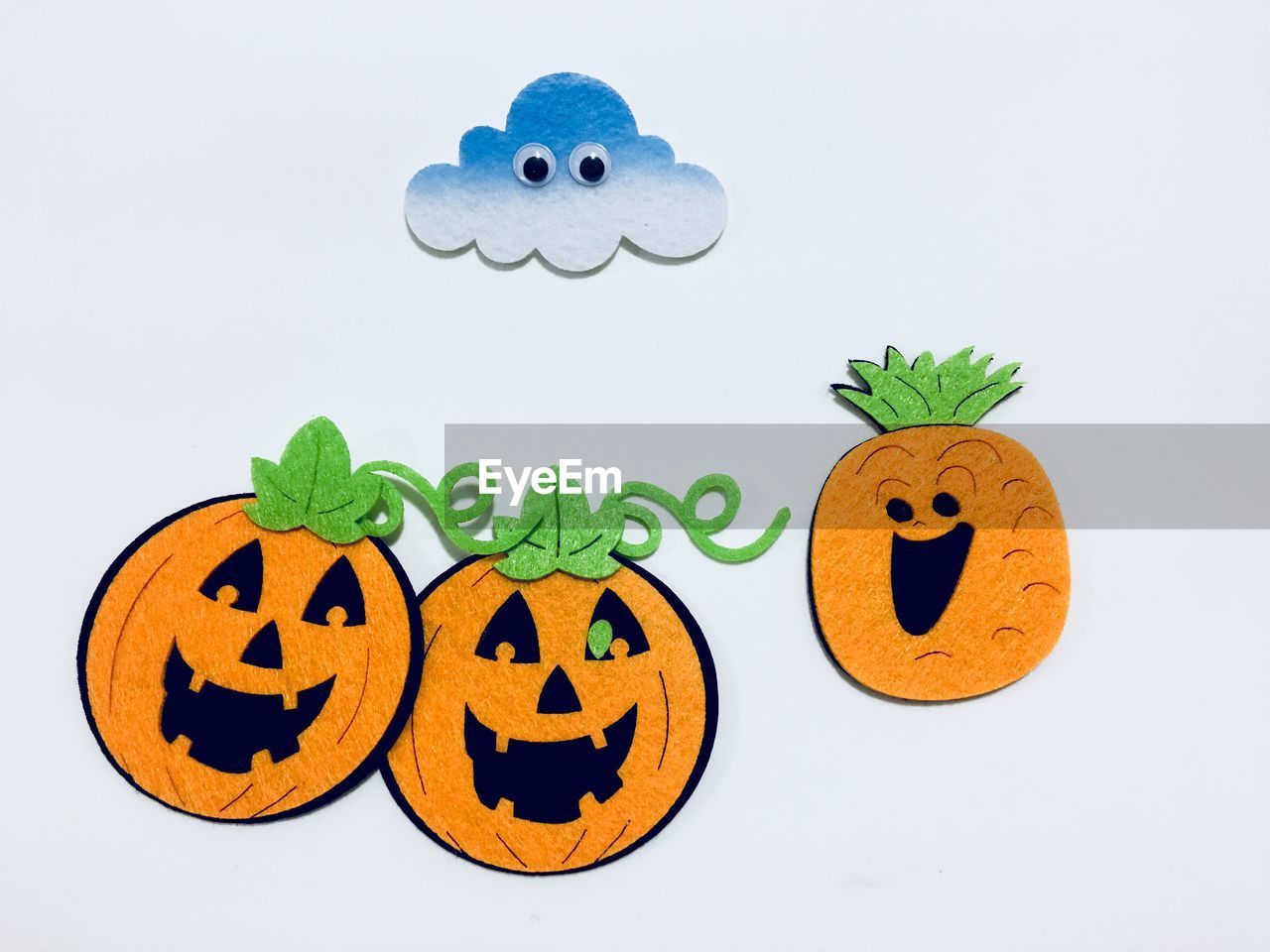 Close-up of jack o lanterns over white background