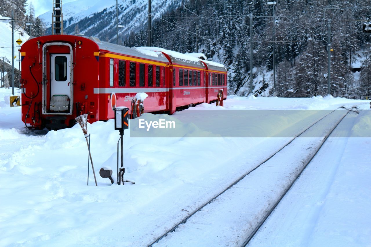 Train on railroad track during winter