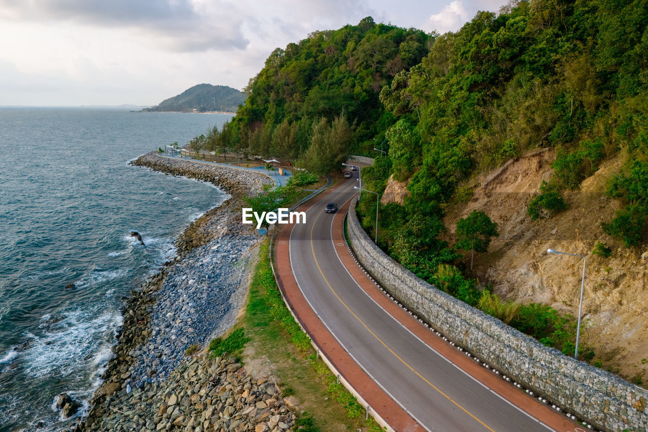 high angle view of road by sea against sky