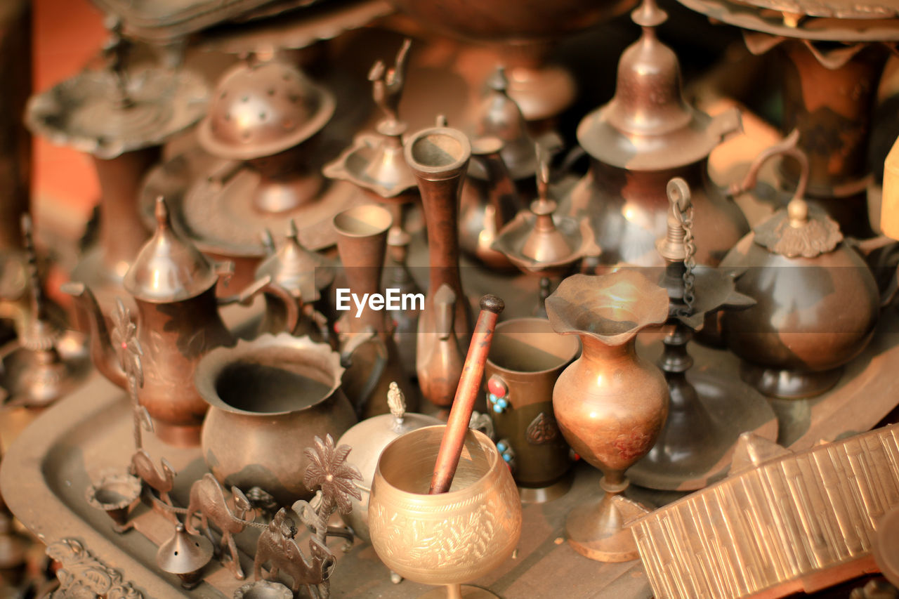High angle view of antique objects for sale