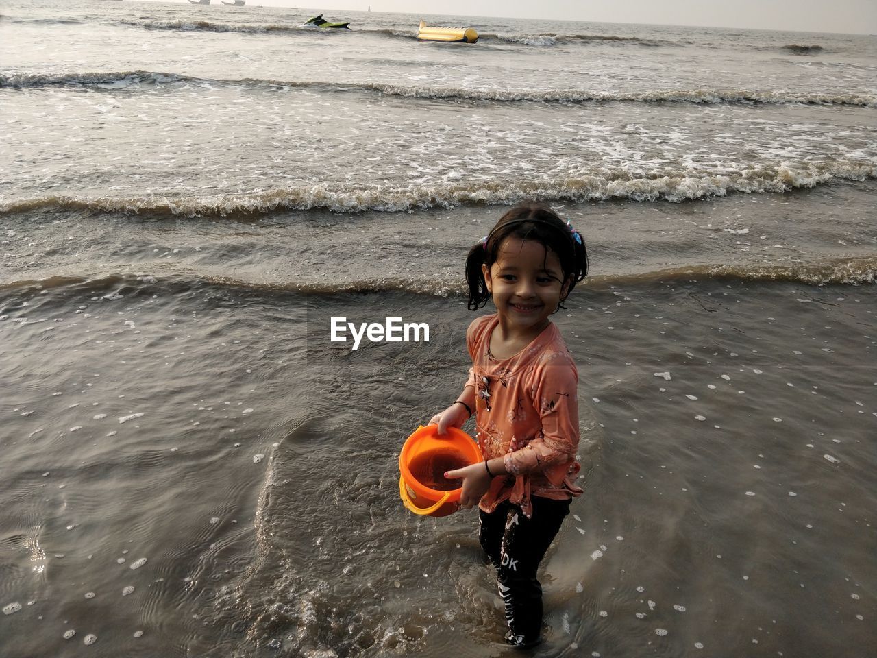 PORTRAIT OF BOY ON BEACH