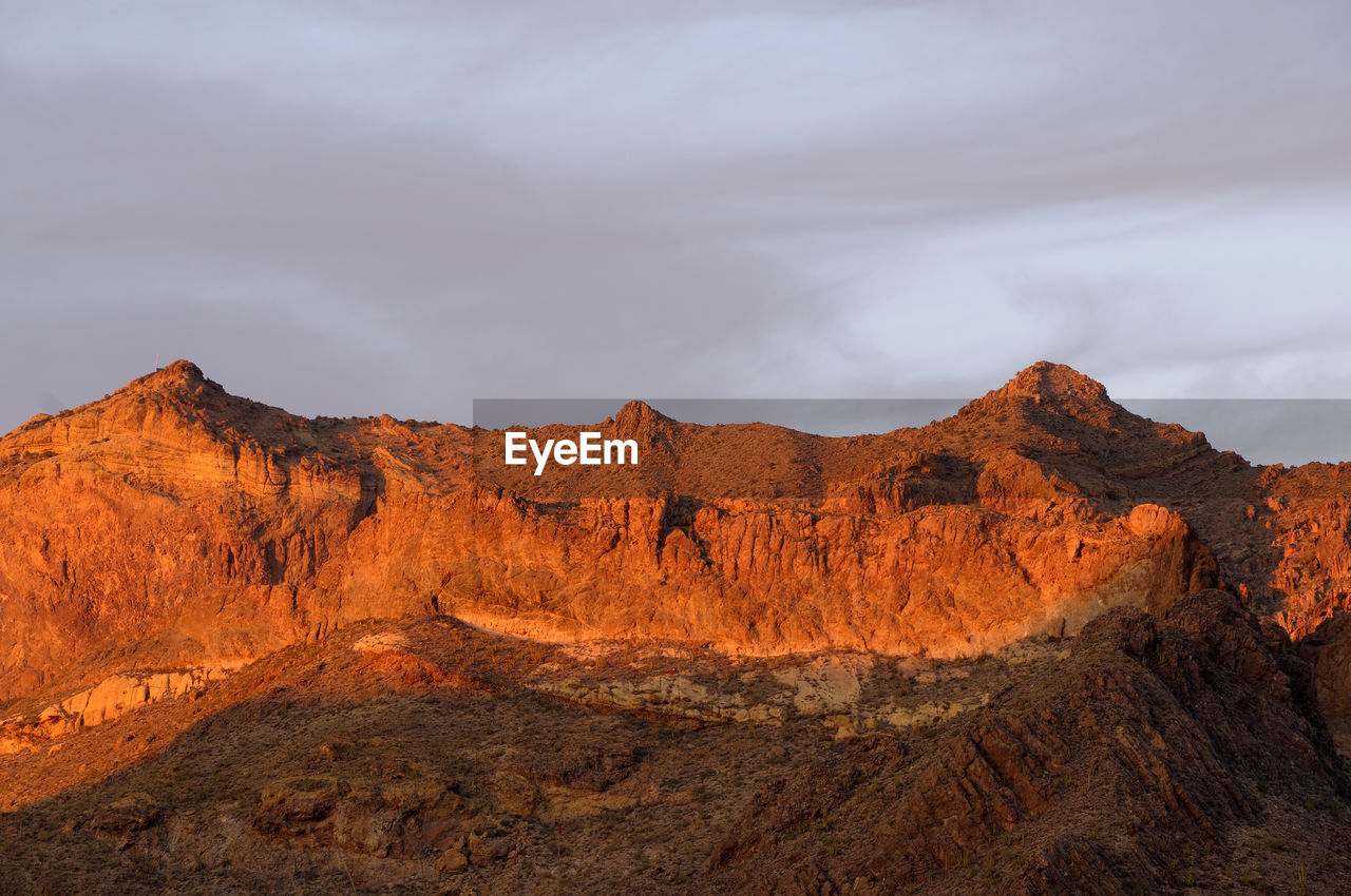 ROCK FORMATIONS AGAINST SKY