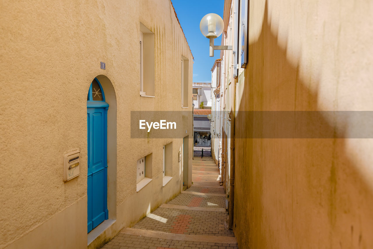 alley amidst buildings in city