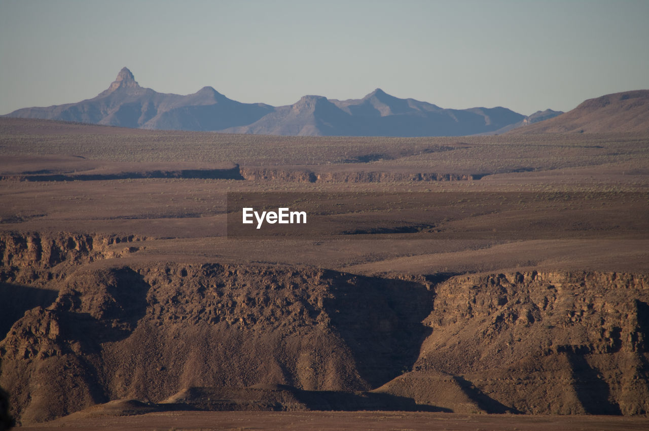 Scenic view of desert against sky