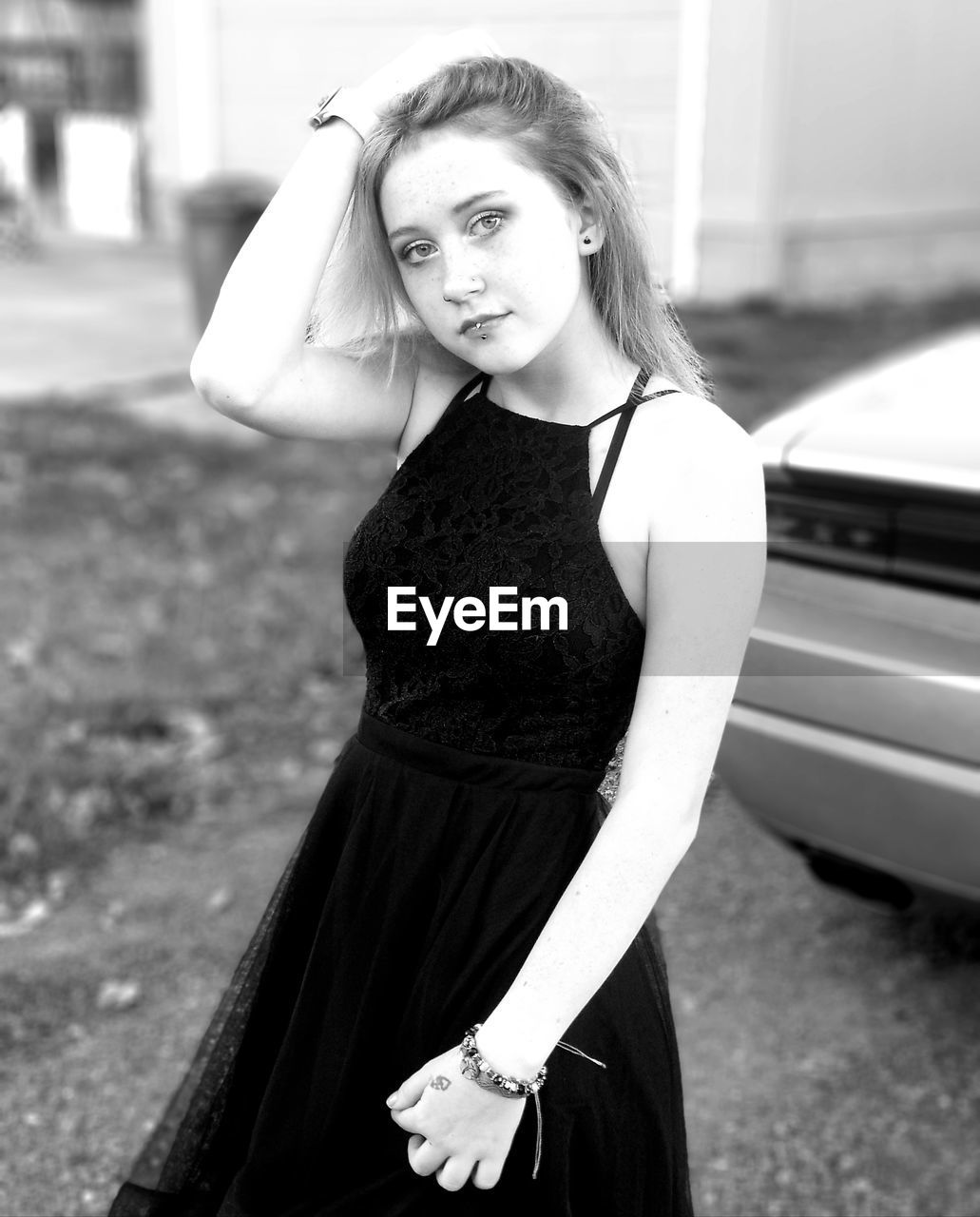 Portrait of teenage girl standing outdoors