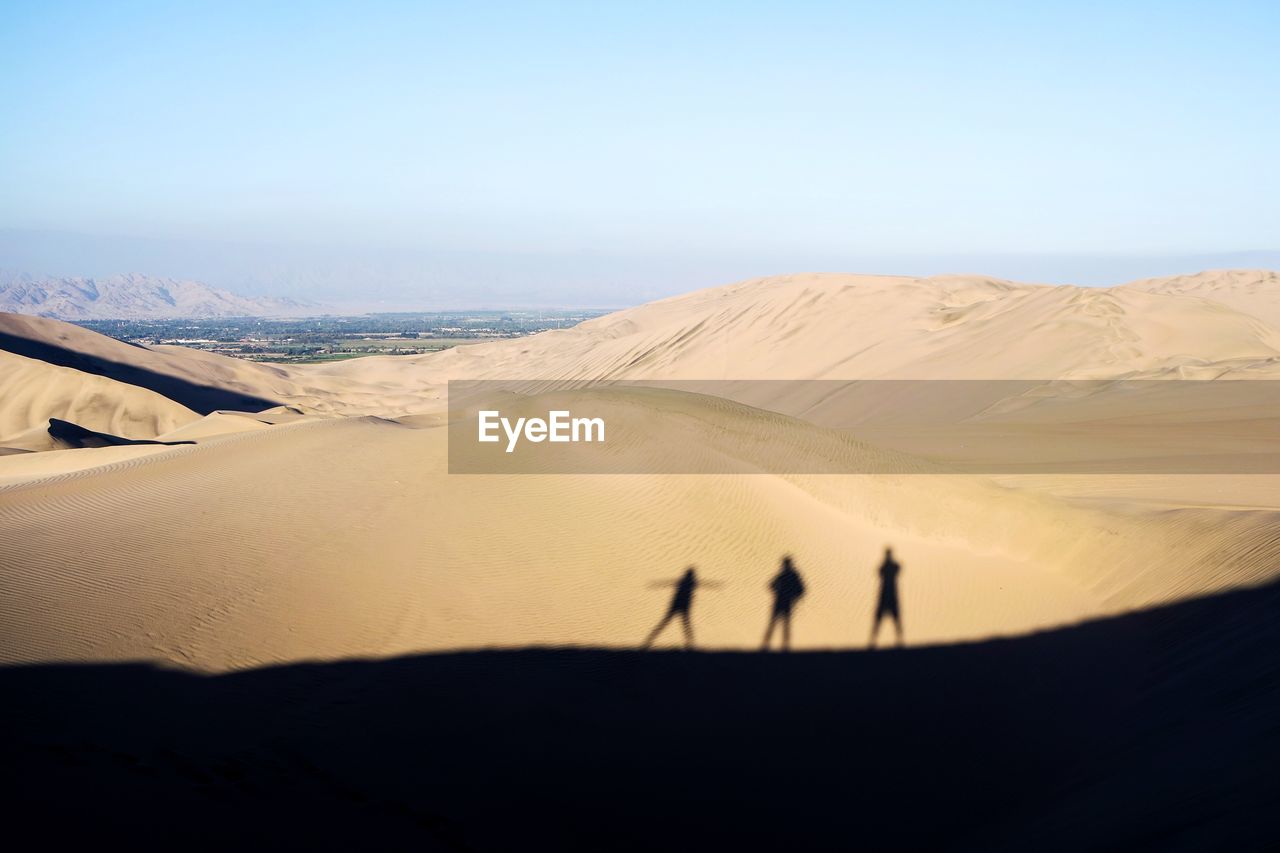 People walking in desert