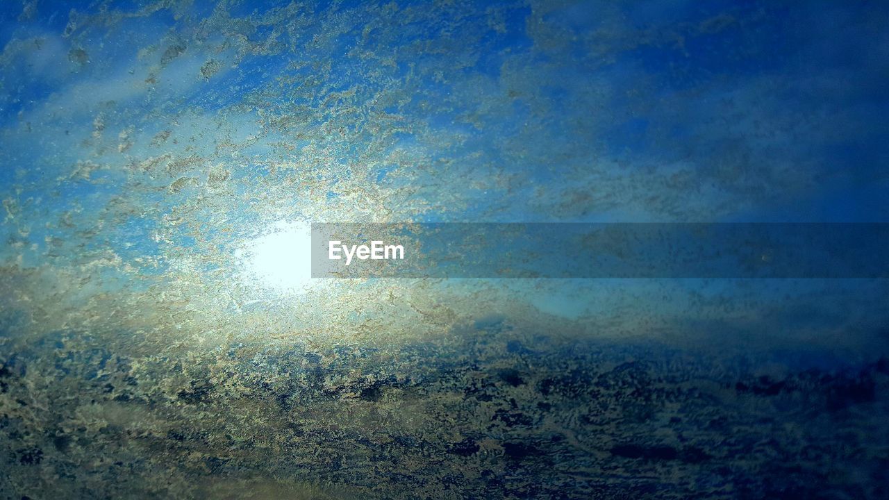 CLOSE UP OF BLUE SKY AND CLOUDS