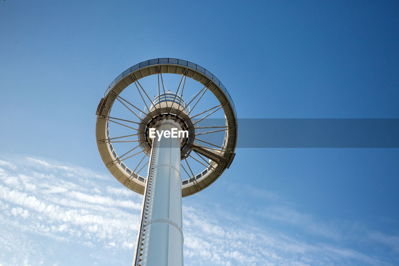 LOW ANGLE VIEW OF ROLLERCOASTER AGAINST SKY