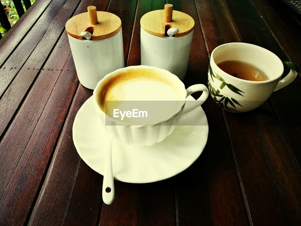 CLOSE-UP OF CAPPUCCINO SERVED ON TABLE