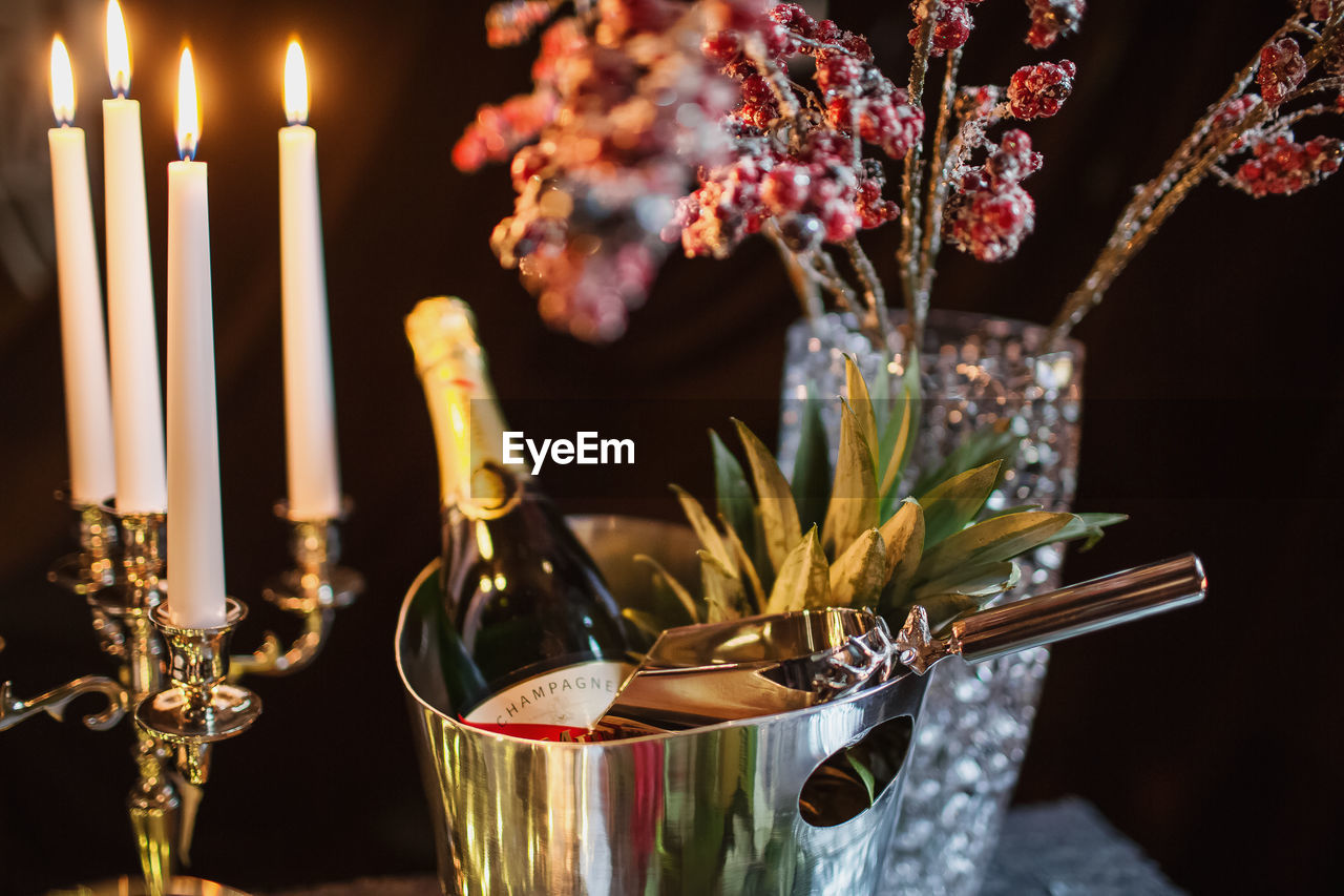 Close-up of wine glasses on table