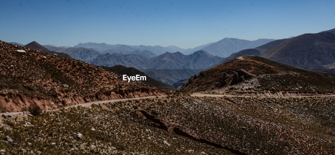 Scenic view of mountains against clear sky