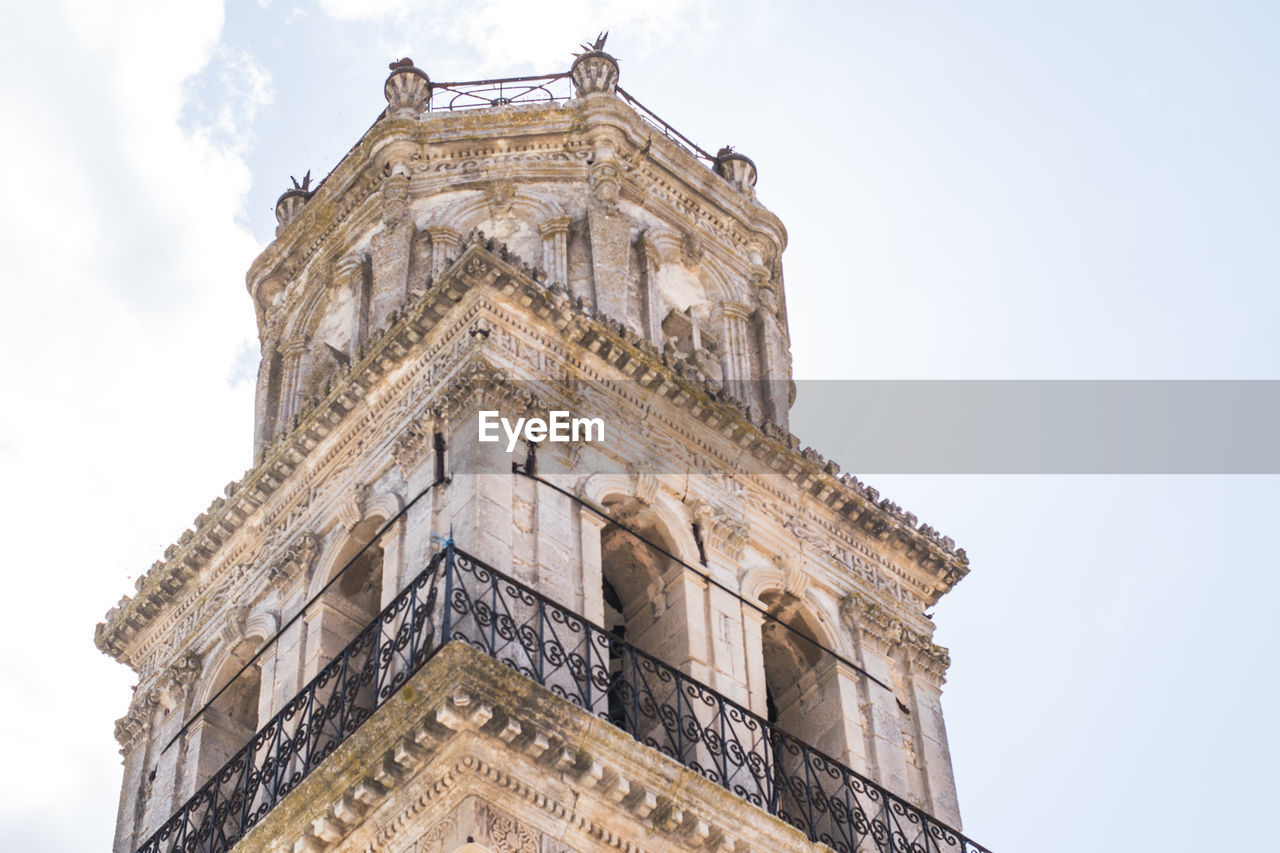 Low angle view of old historic building against sky