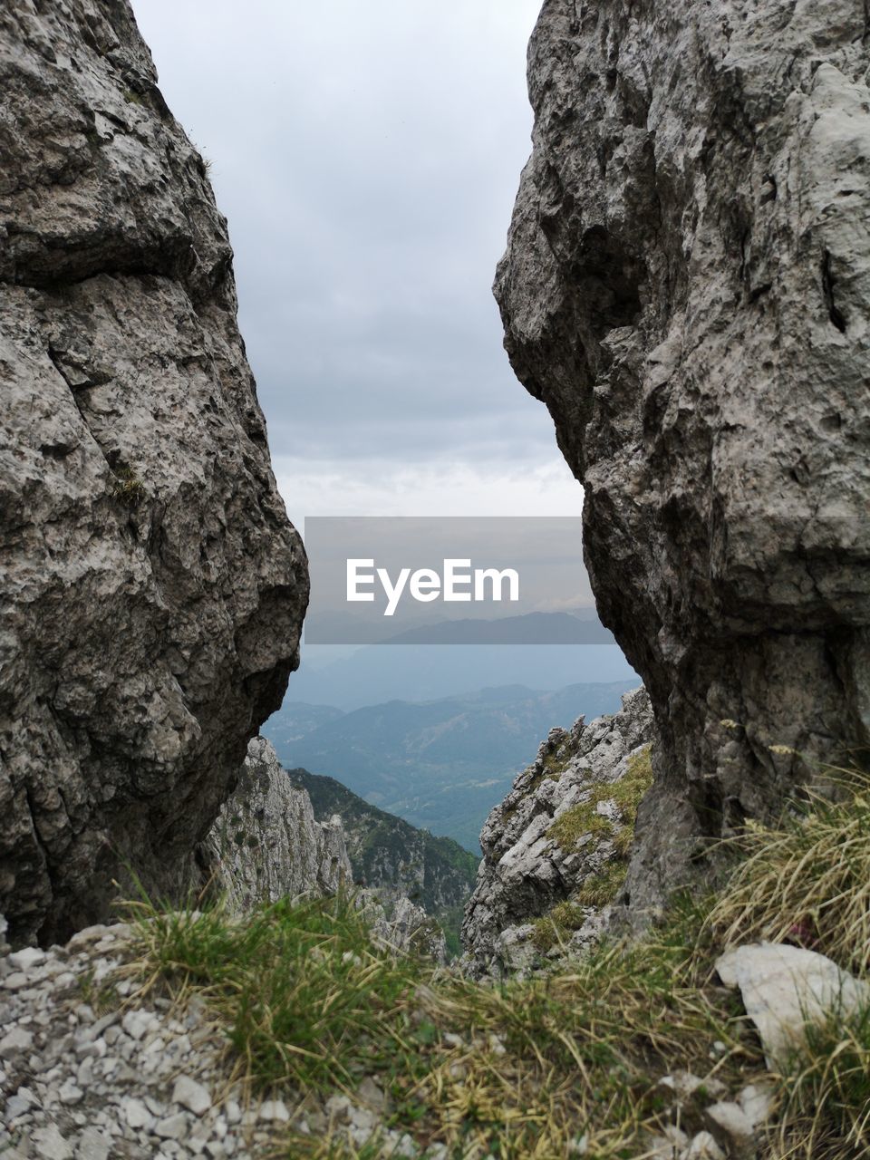 ROCK FORMATIONS ON LANDSCAPE AGAINST SKY