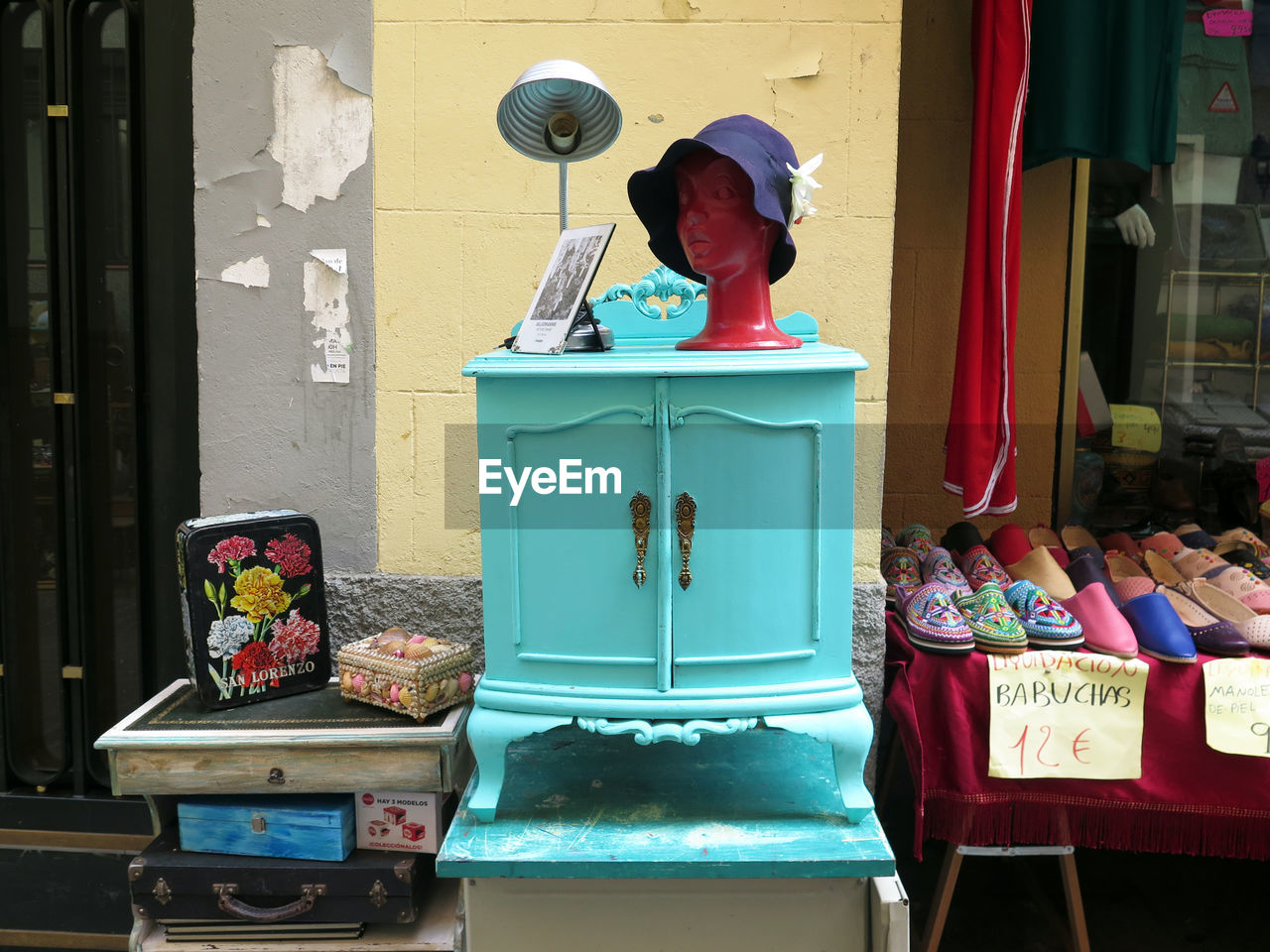 Objects and furniture in a stall of el rastro market, madrid