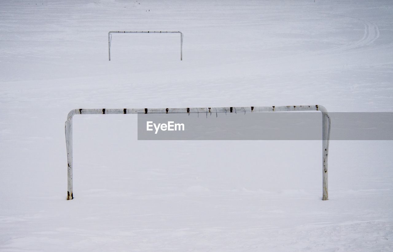 Soccer goal on snow covered field