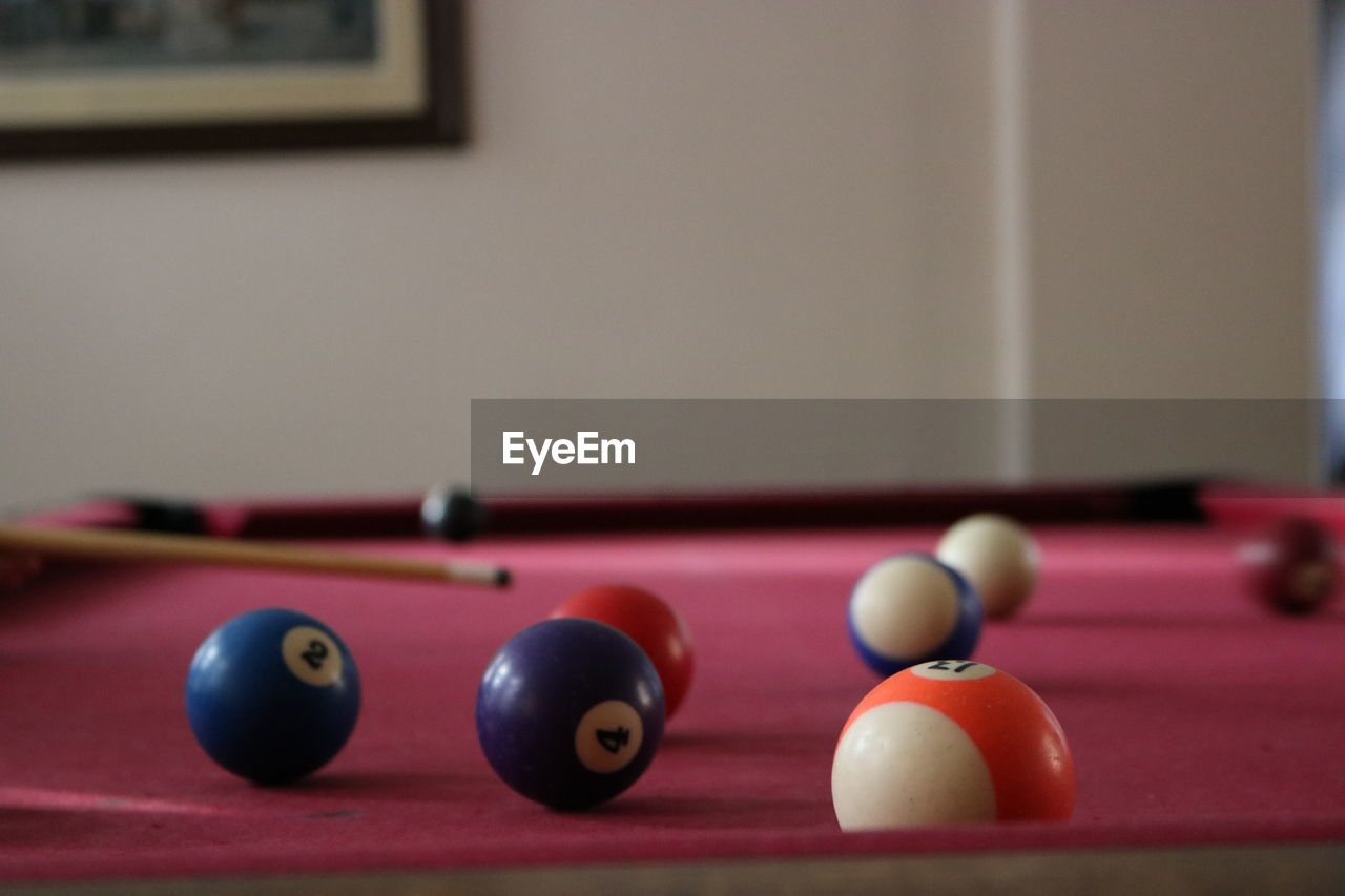 Multi colored balls on table