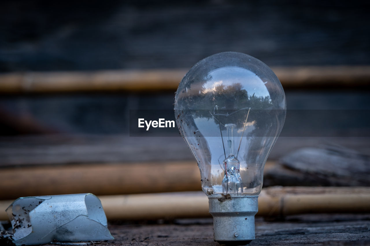 Close-up of light bulb against blurred background