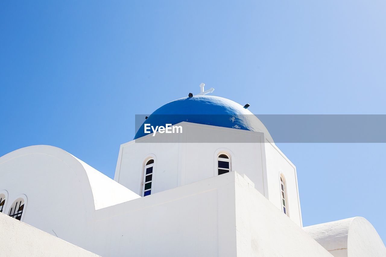 Low angle view of santorini church against clear sky