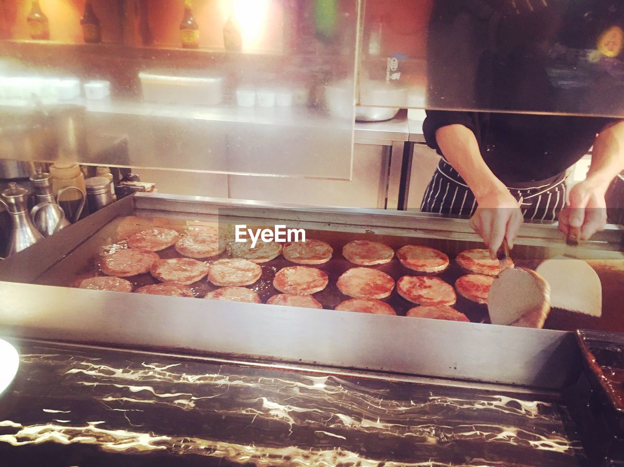 CLOSE-UP OF PREPARING FOOD ON TABLE