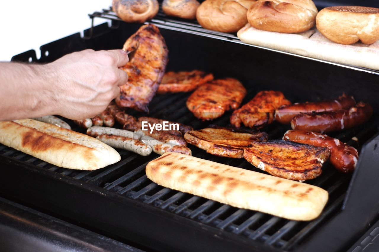 HIGH ANGLE VIEW OF MEAT ON BARBECUE