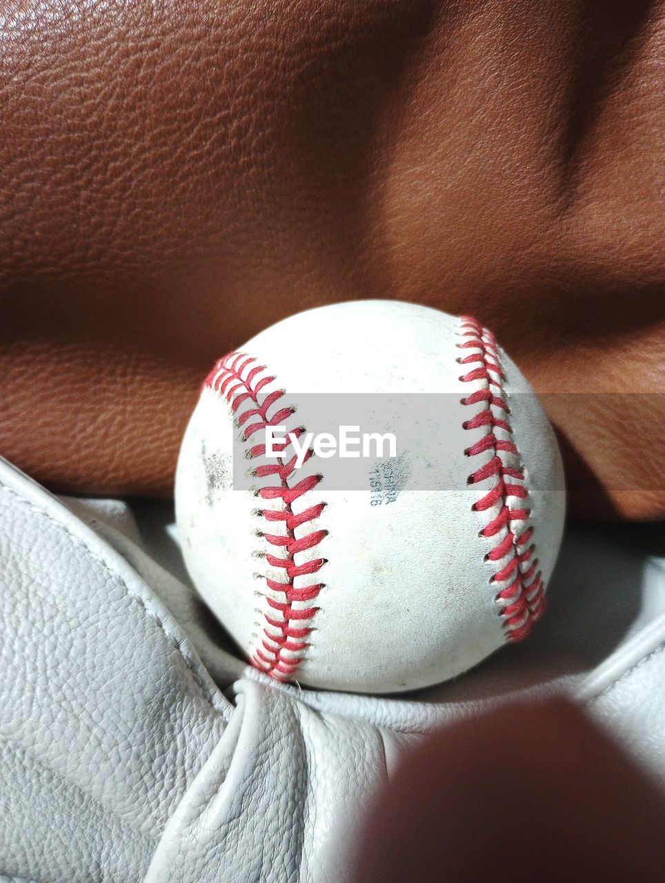 close-up of baseball on fabric